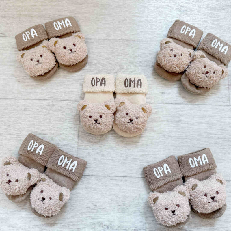 Babyslofjes opa en oma zwangerschap aankondigen
