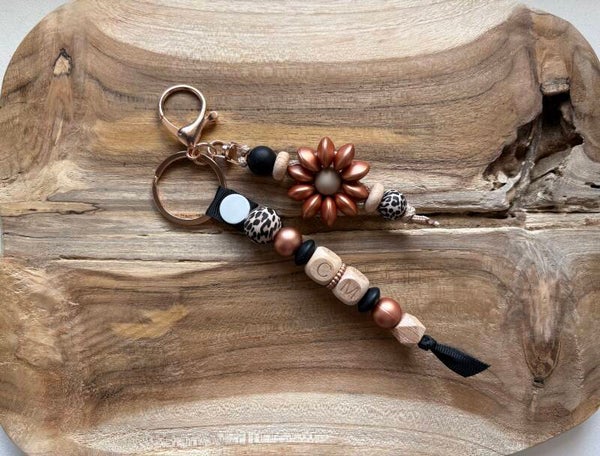 Porte clé double florale
