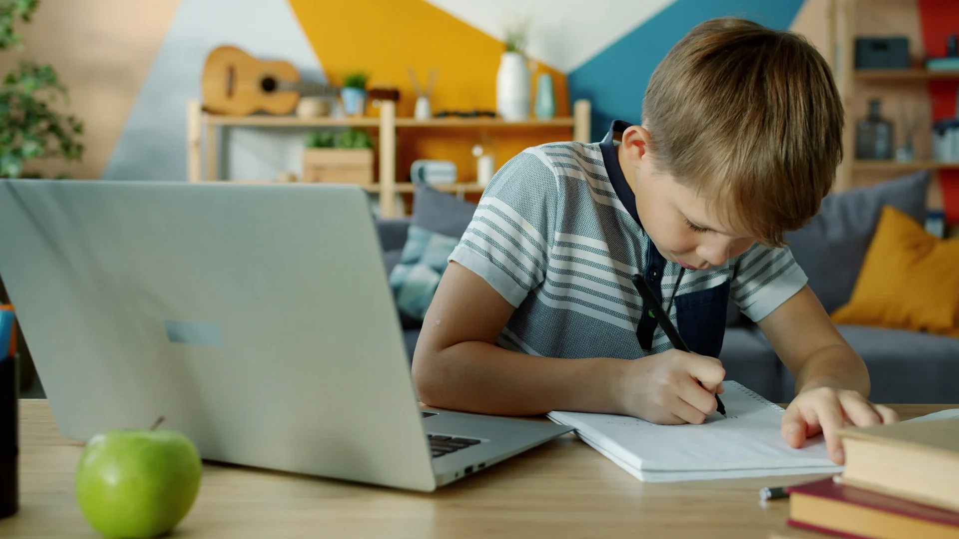 Child learning laptop