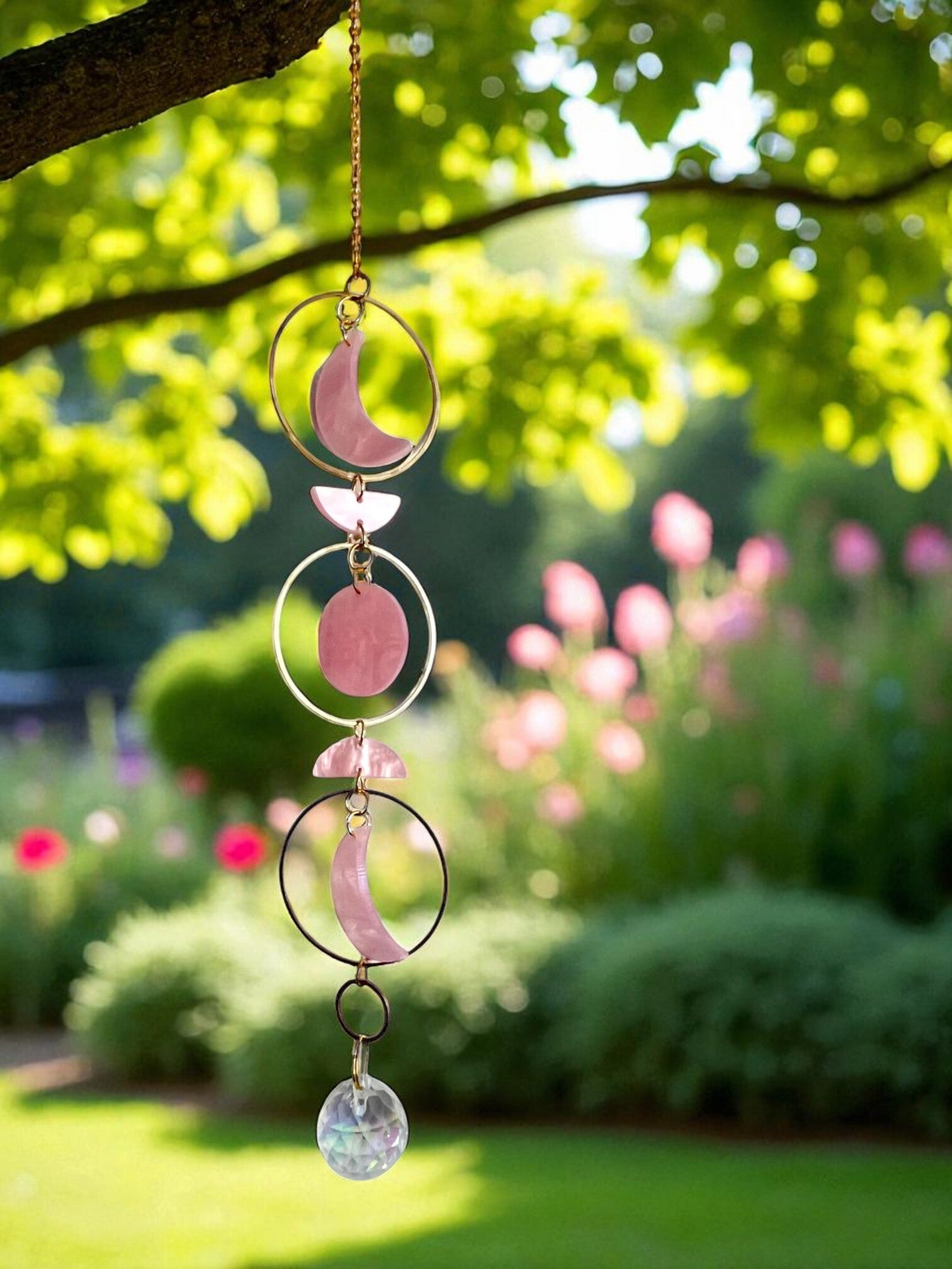 Ophæng i med lyserøde måner og prisme