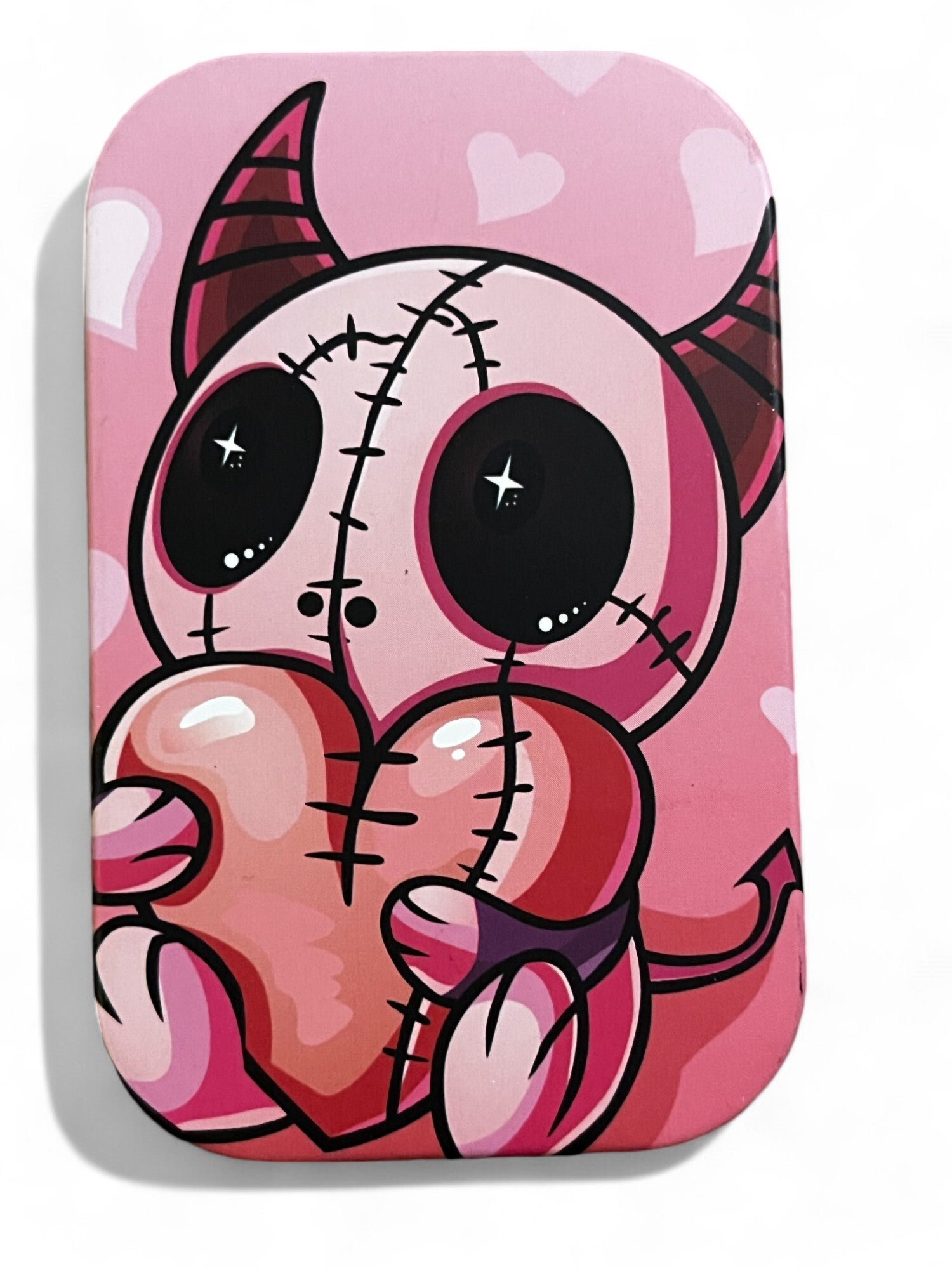 Lille metaldåse med pink djævel