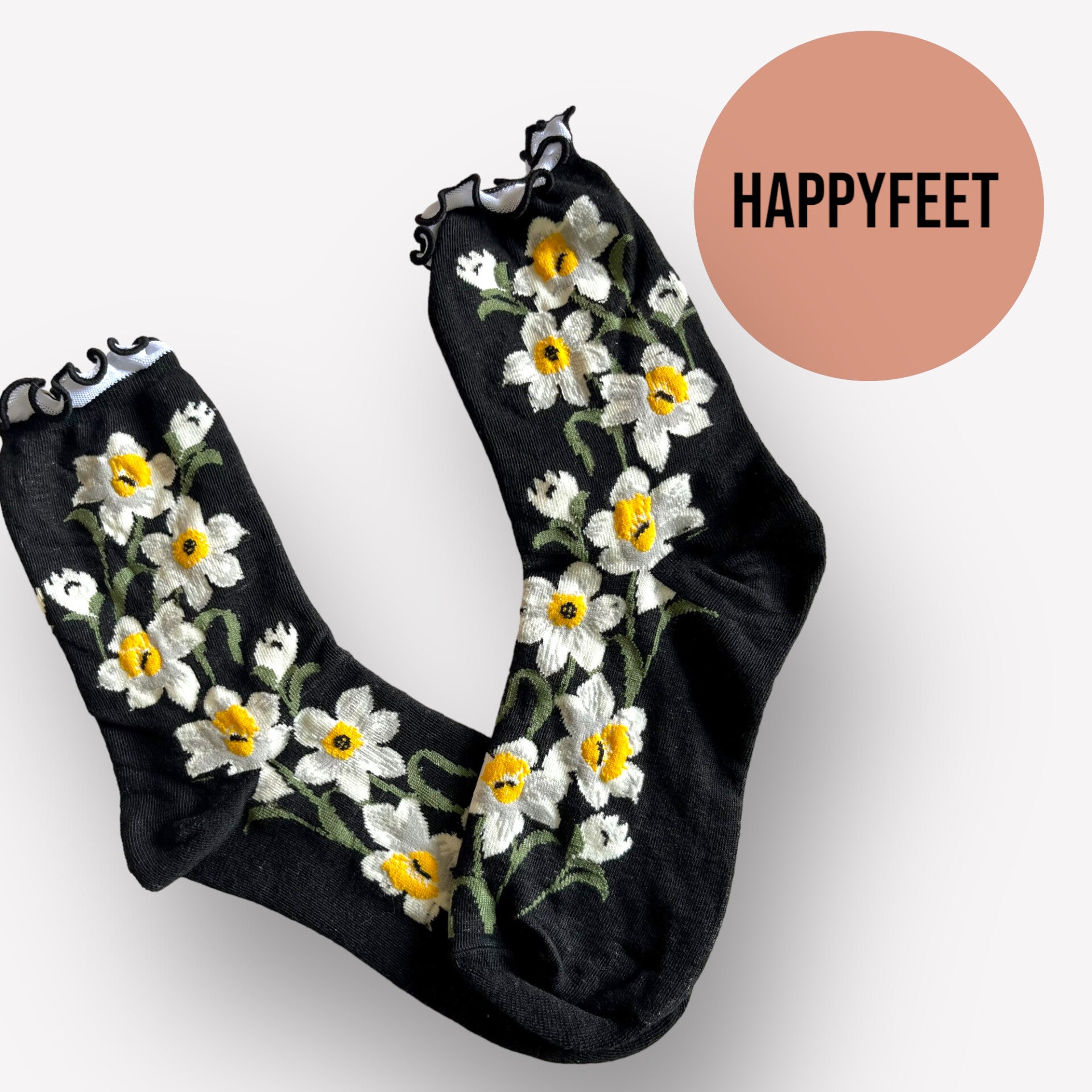 Flotte sorte strømper med blomster og flæse