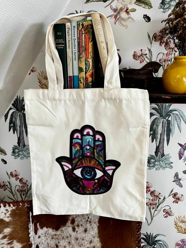 Totebag med paliet hamsa hånd