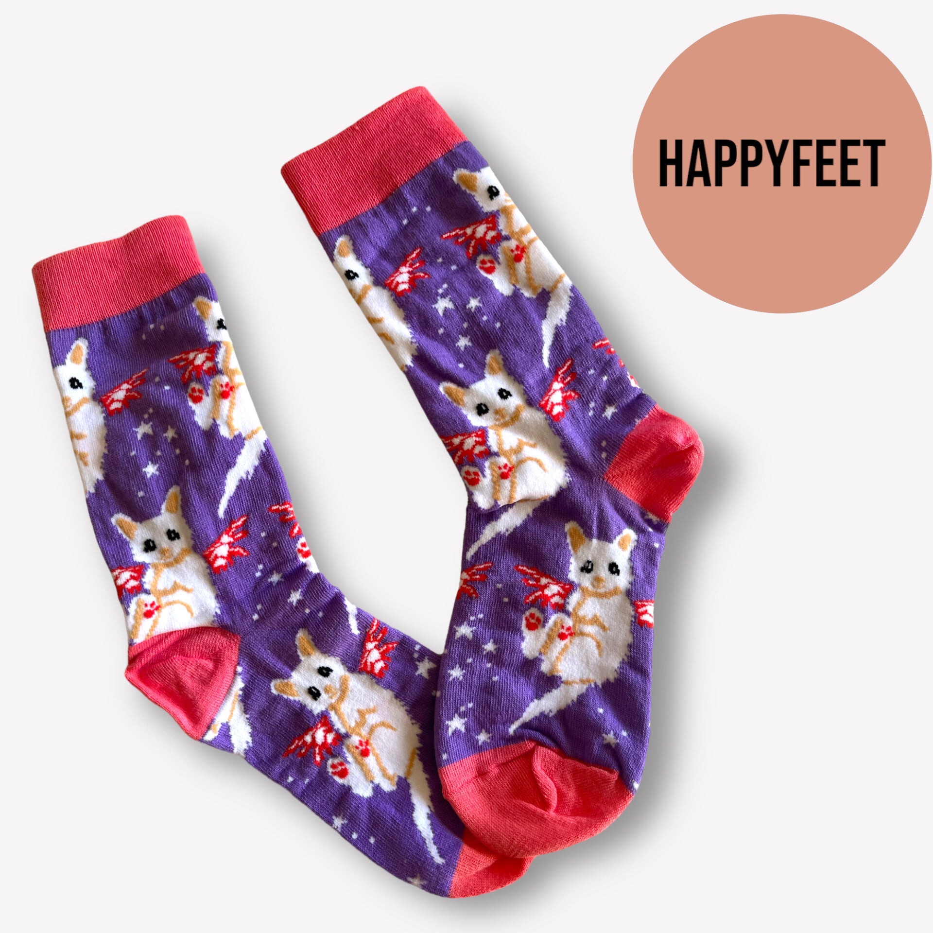 Lilla strømper med hvide katte