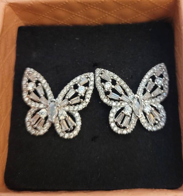 Boucles d'oreilles papillons en métal argenté et zirconias