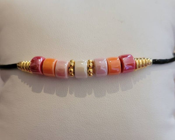 Bracelet en cuir noir et perles en céramique