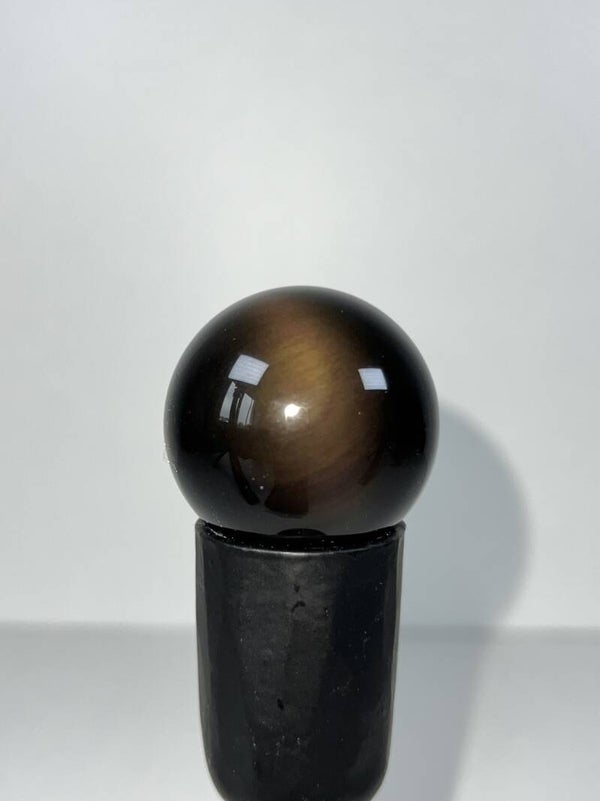 Regenboog obsidiaan bol