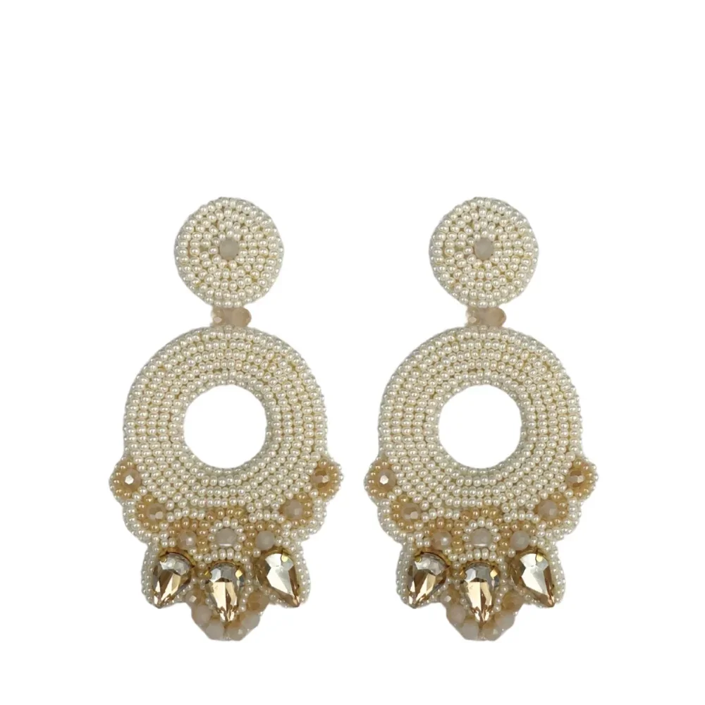 Paulie Pocket oorbel Statement Spark Light Beige