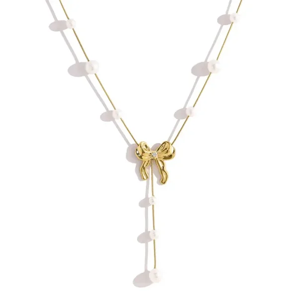 Elegant bow tie necklace gold