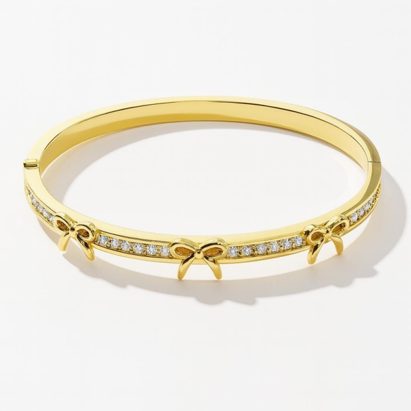 Triple bow tie bangle gold