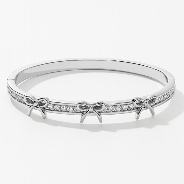 Triple bow tie bangle silver
