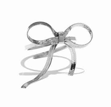 Flexible bow tie ring silver