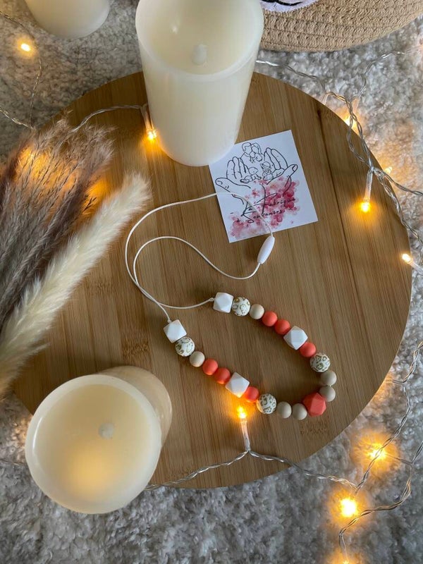 collier d'allaitement orangé