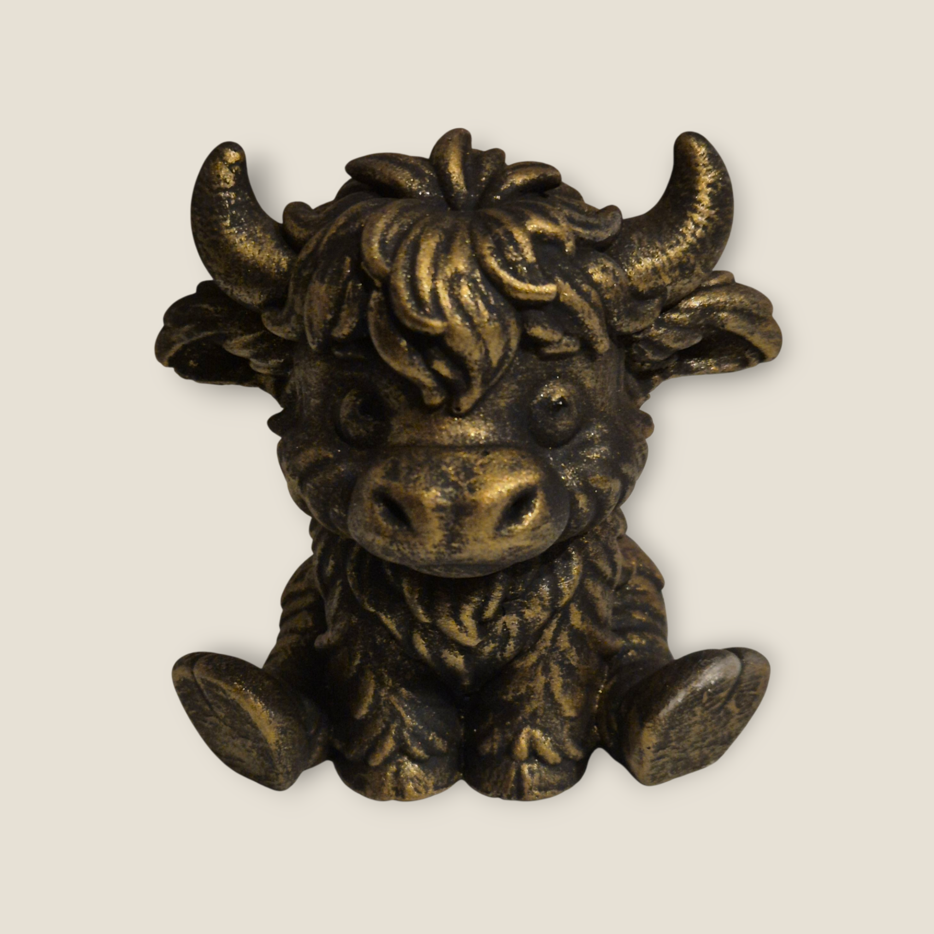 Zittend op de billen Hooglandertje