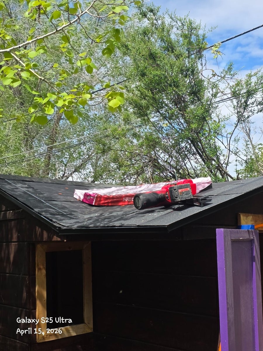 Bountiful shed roofline during shingle installation
