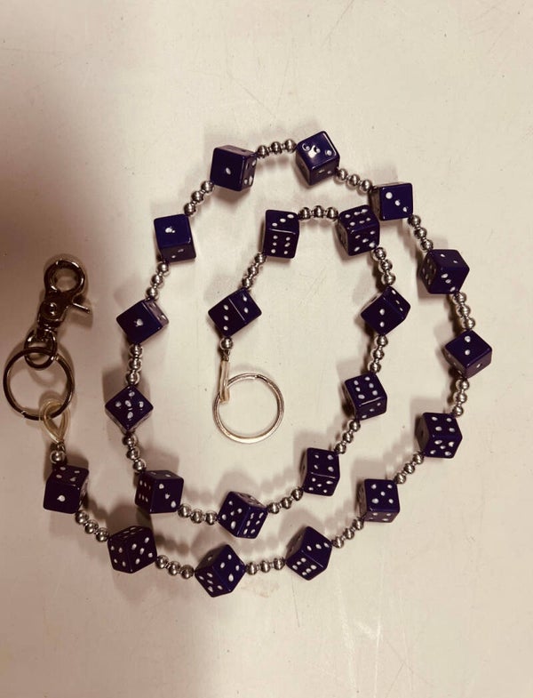 Beursketting met dobbelstenen.