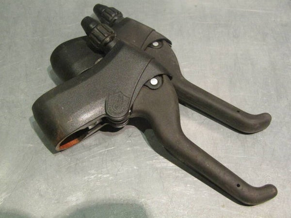 CAMPAGNOLO OLYMPUS Vintage 90's Brake levers, one lever will show some minor shelf wear rust on the inner section of the Lever Strap, never used nor mounted BXCC0063 0995 08/18/25