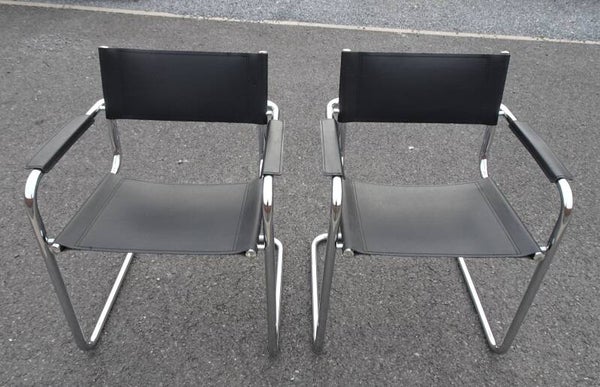 pair Mart Stam B34 leather chrome slide chairs. Marked made in Italy