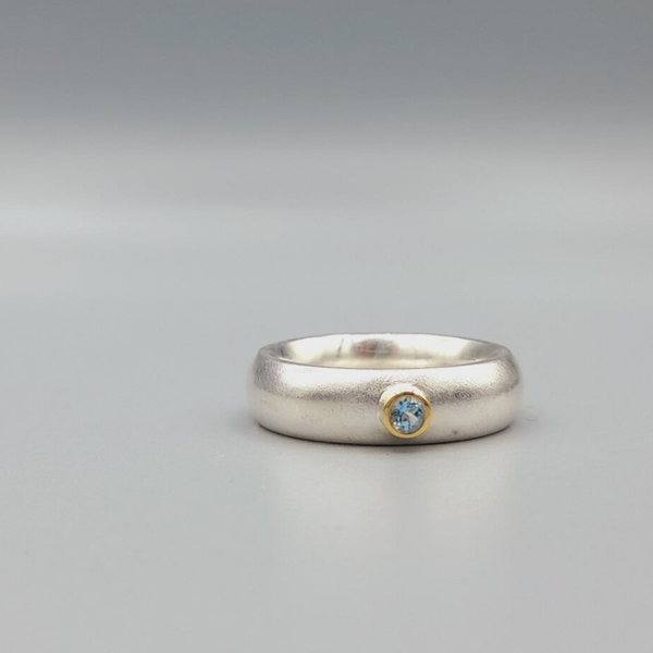 Goud en zilver ring mat.