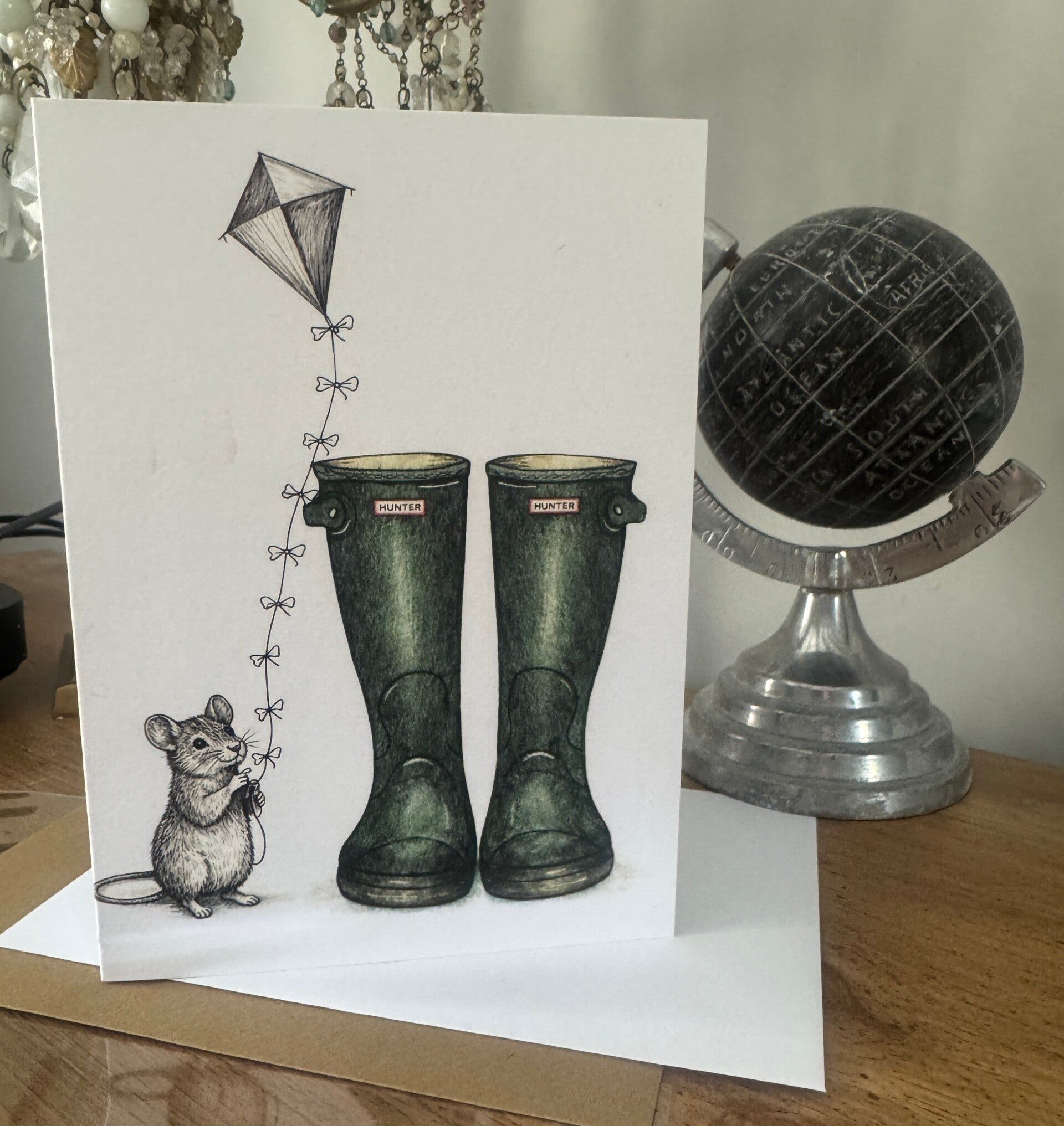 The Farm Lasses Hunter Wellies and mouse flying a kite greetings card for all occasions.