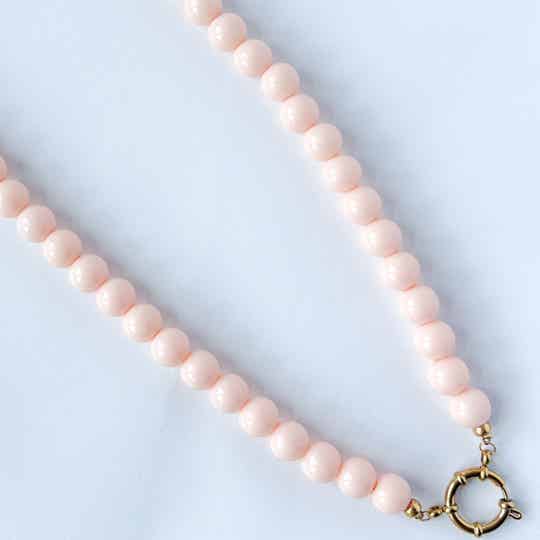 Bubblegum damesketting met boeislot & bedel – licht perzik