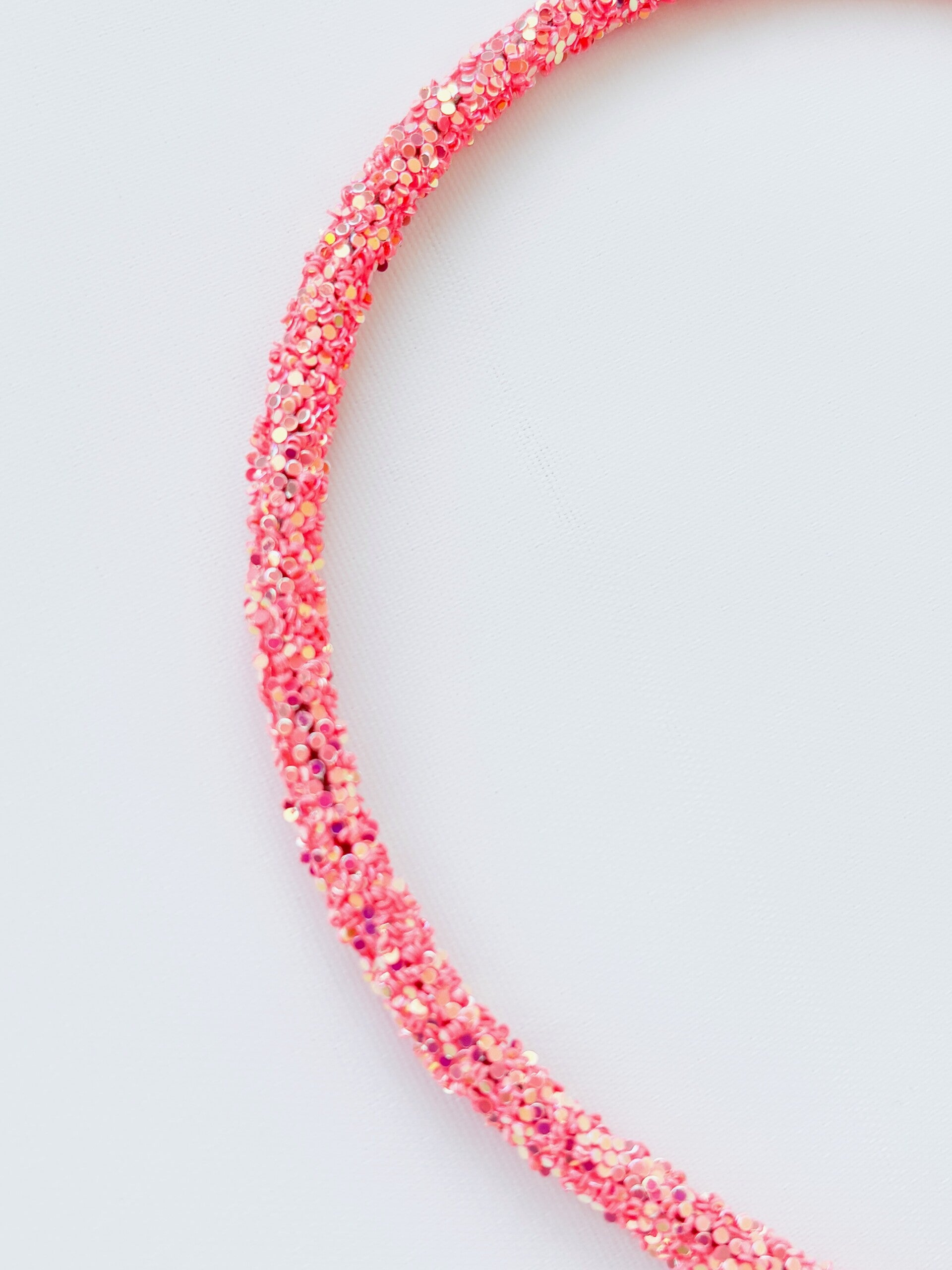 Haarband met all-over glitters - koraal oranje