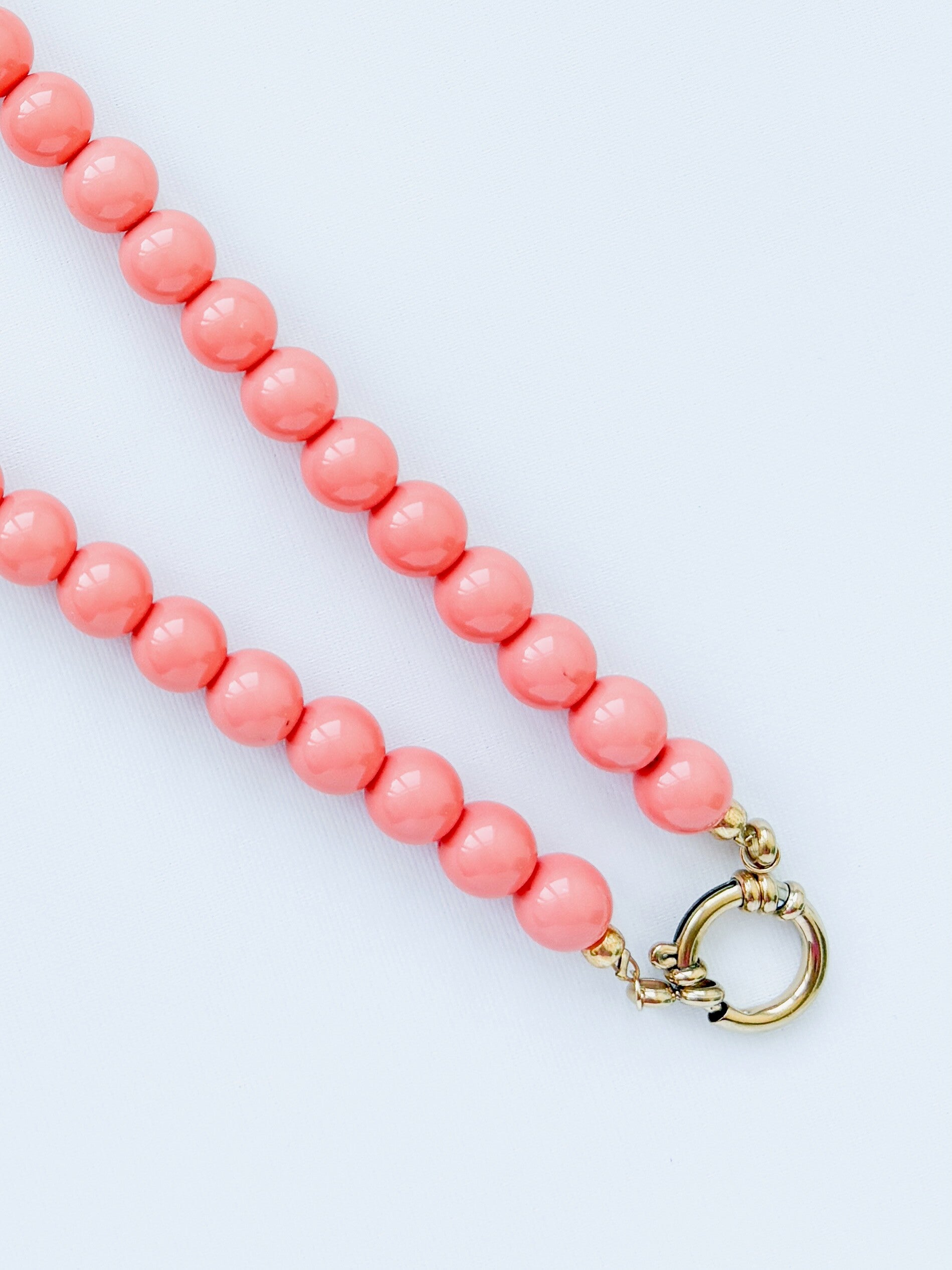 Bubblegum damesketting met boeislot & bedel – oranje