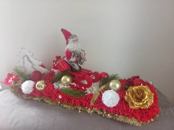 centre de table traineau avec pére noel