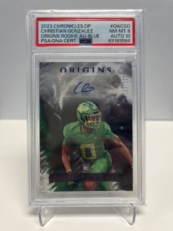 2023 Chronicles DP Christian Gonzalez Origins Rookie AU-BLUE Auto PSA 8 123/125