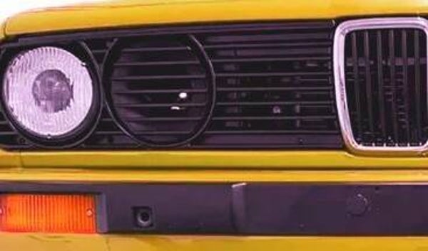 BMW E30 ajovalojen ilmanotto