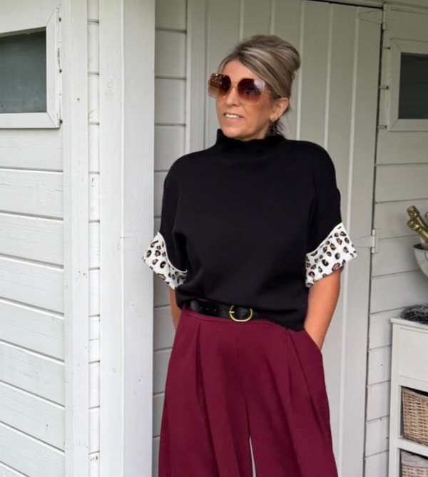 Truitje met leopardomslag aan de mouw zwart