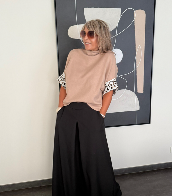 Truitje met leopardomslag aan de mouw