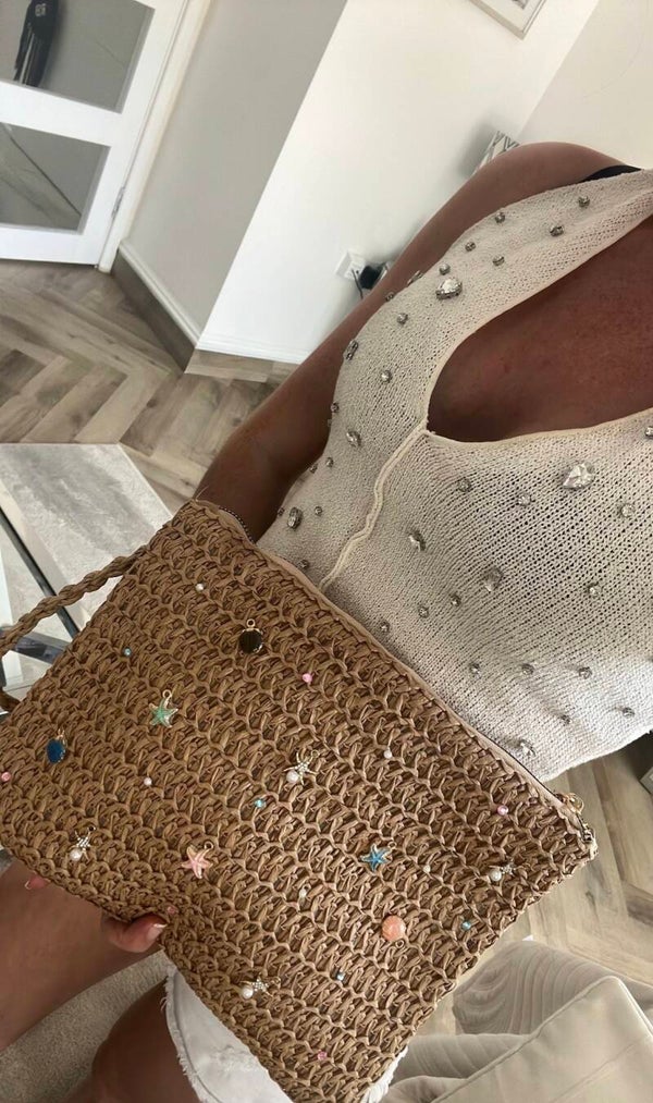 Charm clutch bag