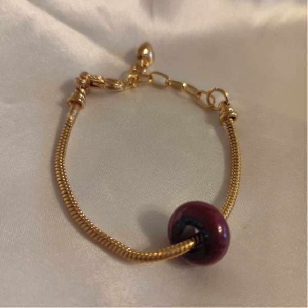Armkette Gold mit Bordeux Perle