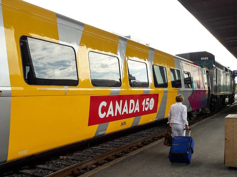 A passenger car adorned in Canada 150 livery, August 2017. For the country's sesquicentennial, Via released a special youth rail pass.