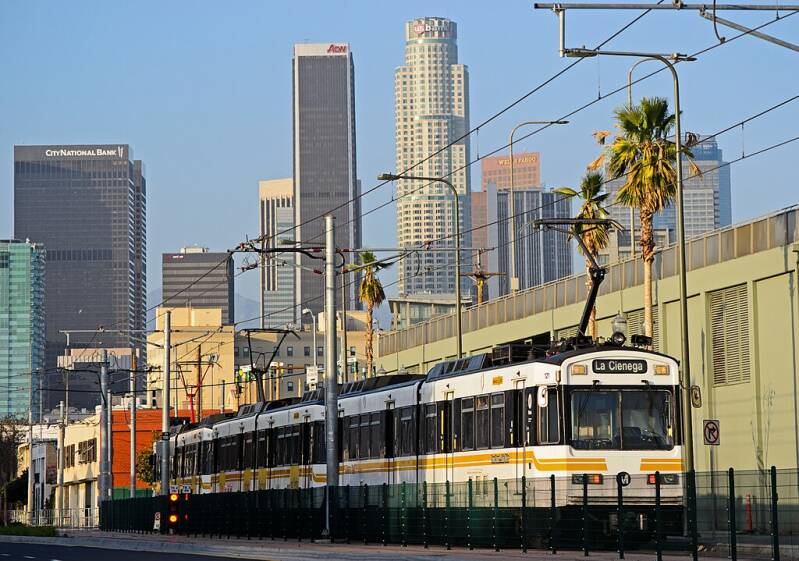 An E Line (then known as the Expo Line when this photo was taken) test train headed southbound along Flower Street.