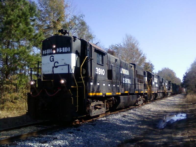 Georgia Central U23Bs lead a freight train through Garden City, Georgia in 2010.