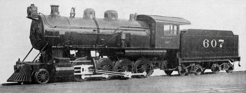 A black-and-white image of a 2-8-0 steam locomotive and tender