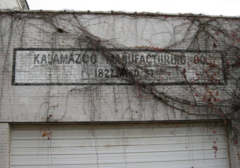 The faded name on the Reed St. manufacturing building in 2009.
