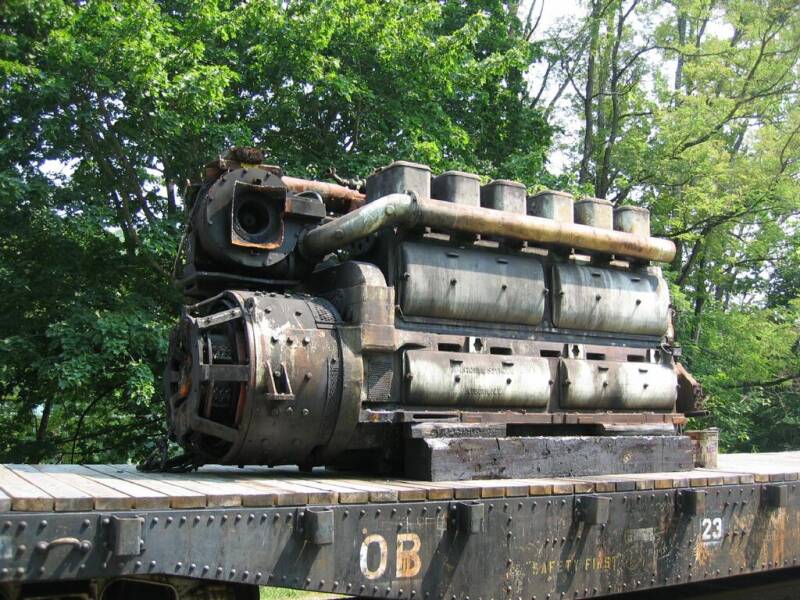 A 6-cylinder McIntosh & Seymour engine on a flat car.