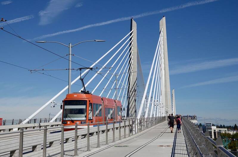 The Portland Streetcar system began using TriMet's new Tilikum Crossing bridge in September 2015.