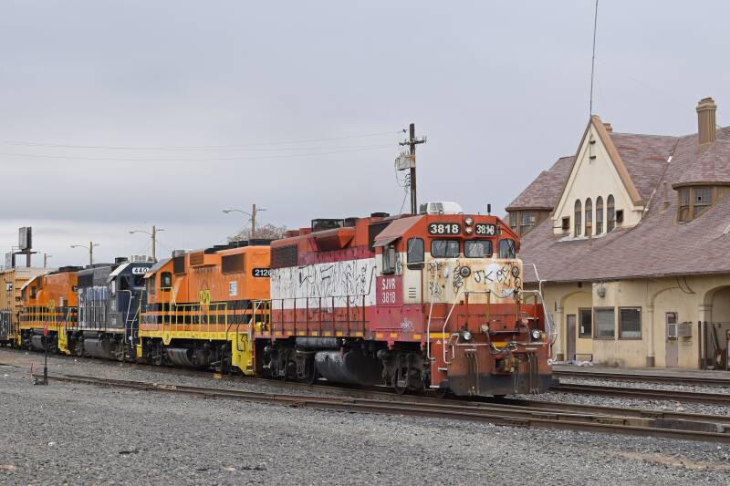 Four different SJVR locomotives in Bakersfield - GP38-2, BL20-2, GP40, and GP15-1.