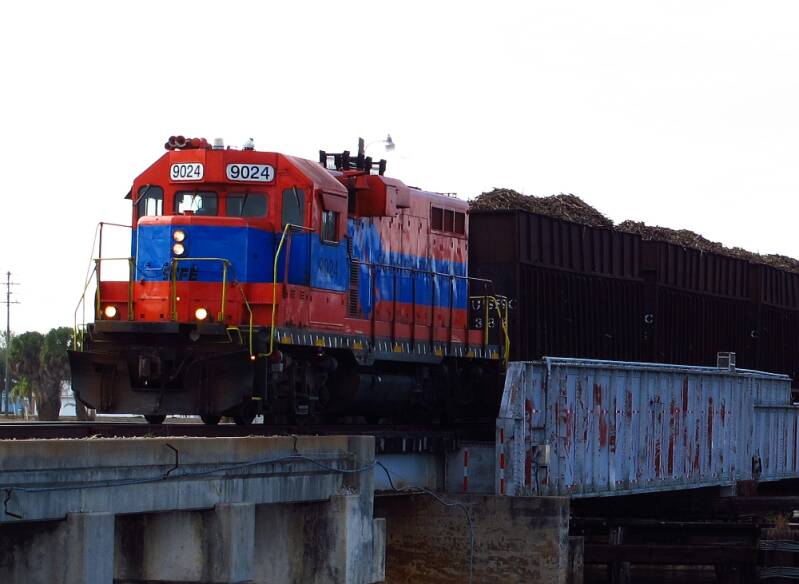 South Central Florida Express crossing Moore Haven Swing Bridge over the Caloosahatchee Canal.
