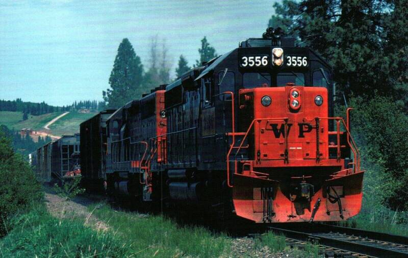 WP EMD GP40 No. 3556 cresting the grade at Mica, WA in 1982.