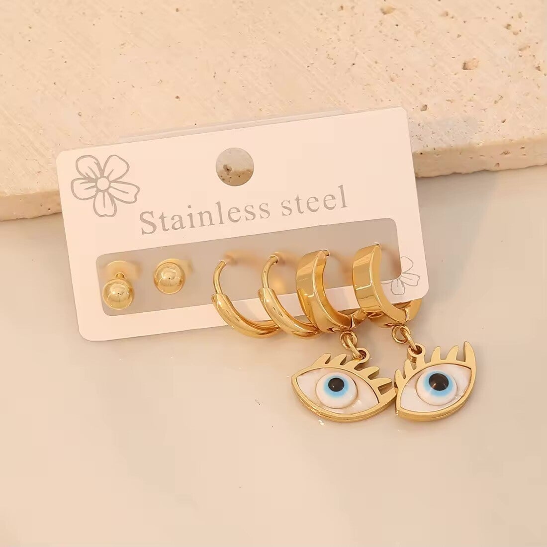 Set Of Triple White Eyes Earrings