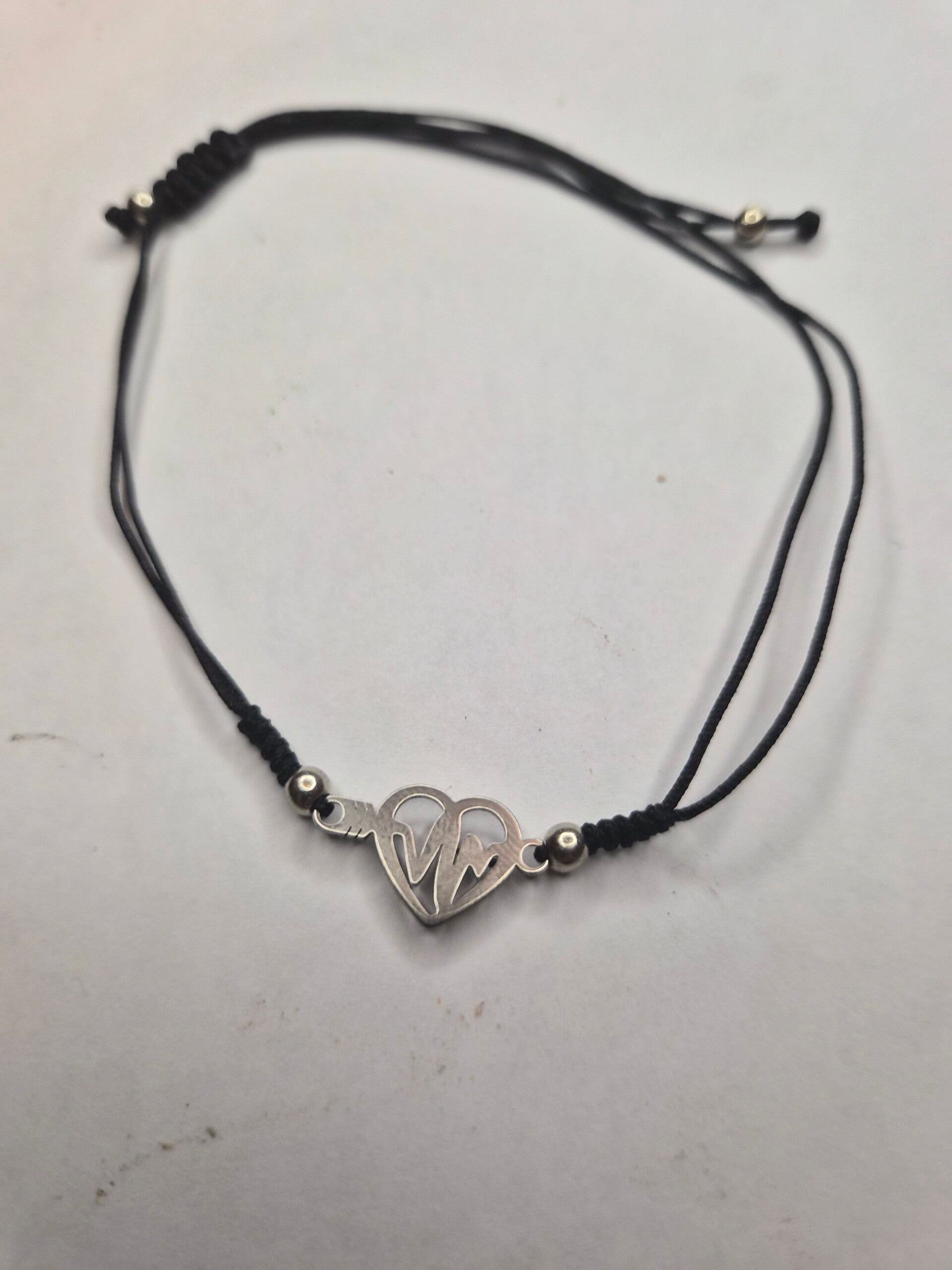 Bracelet fin coeur tension
