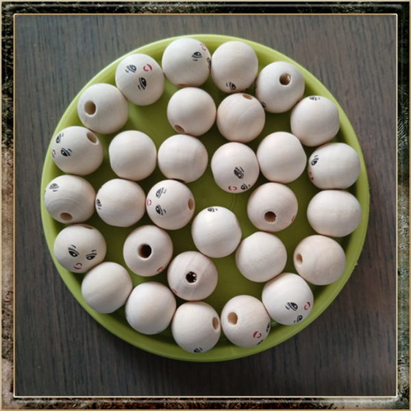 30 Houten kralen met poppen gezichtje 20mm