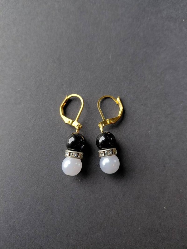 Elegante oorbellen met zwart-witte kralen 🖤🤍✨
