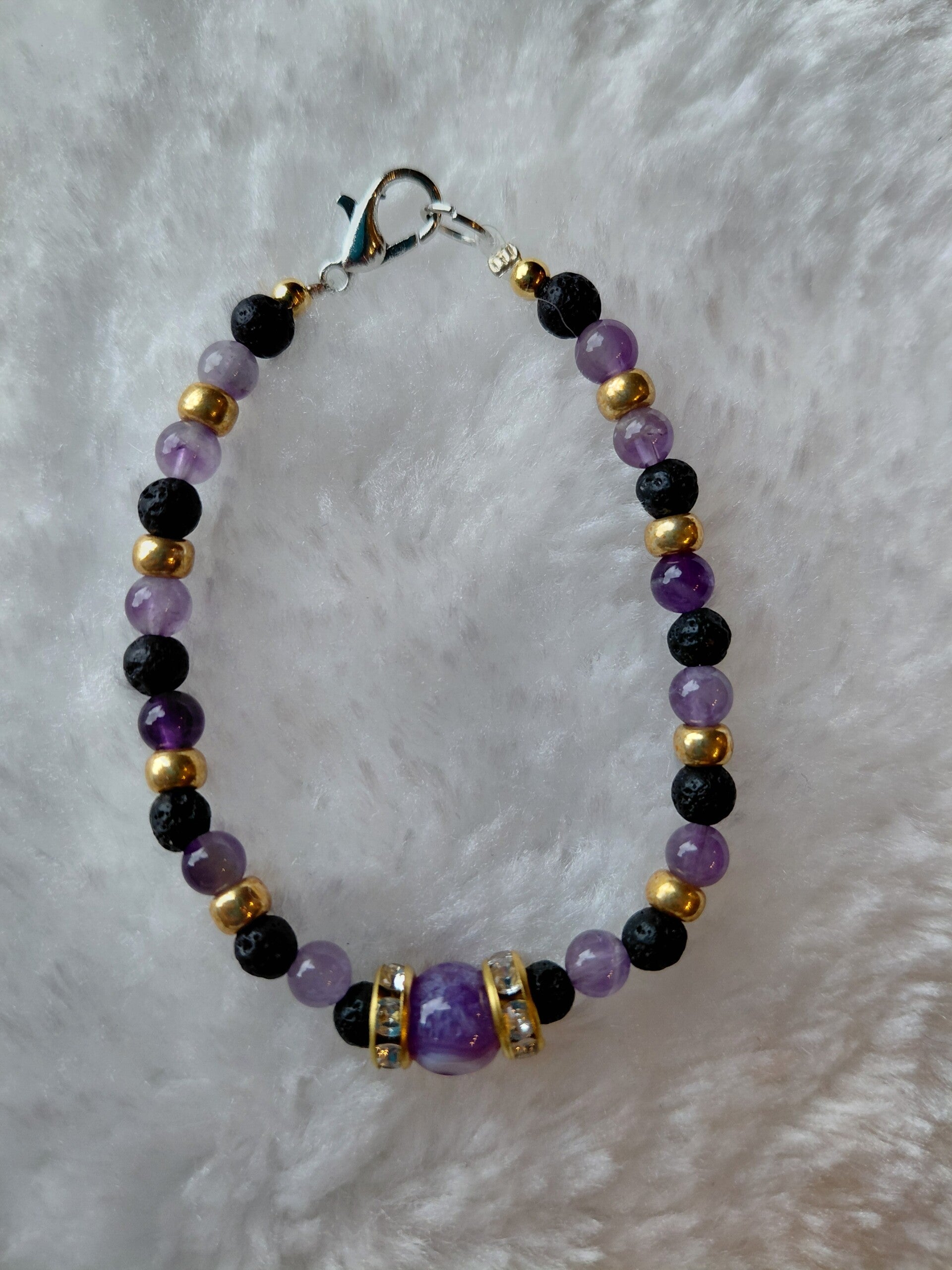 Amethist lavakraal armband met grote amethist kraal