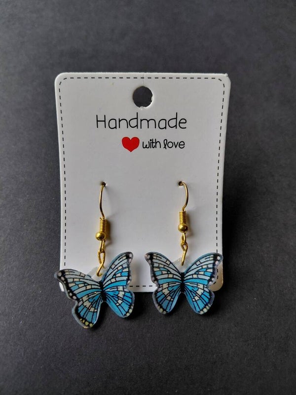 Handgemaakte vlinder oorbellen – blauw & goud